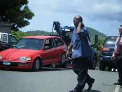 The red Honda Civic bein towed away has been identified as belonging to double homicide suspect Steve Tyson. The red Honda Civic bein towed away has been identified as belonging to double homicide suspect Steve Tyson.